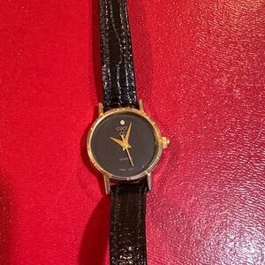 Gucci Black and Gold Quartz Watch